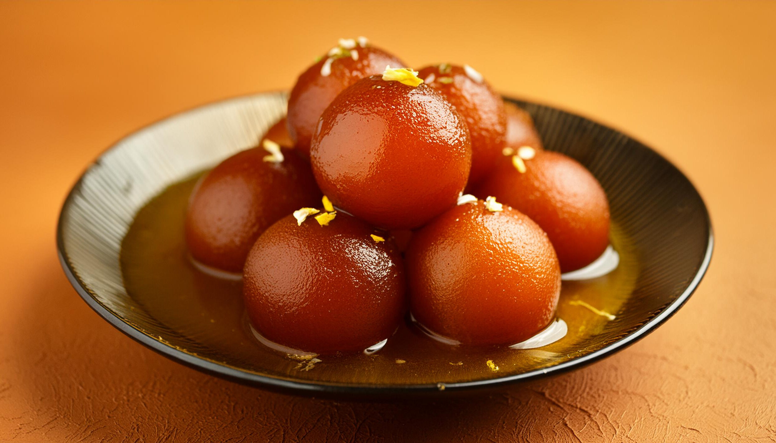 Indulge in the Best and Delicious Gulab Jamun for a truly mesmerized experience at Tandoori Bliss Adelaide Australia.