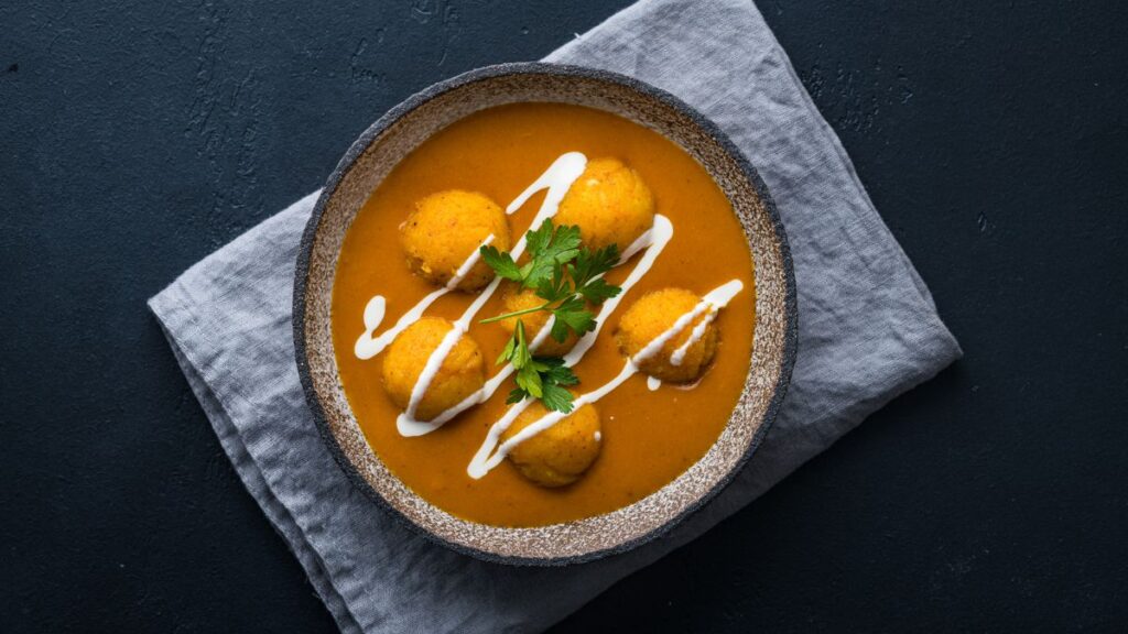Indulge in the ultimate creamy delight with our exquisite Malai Kofta, prepared using the most authentic recipe and traditional techniques straight from the bustling streets of India.